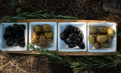 Olive siciliane: storia, origini, varietà agronomiche e usi nella cucina siciliana